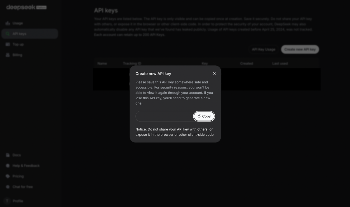 The new key window, with the key hidden and a Copy button, and a notice that the key cannot be viewed again.