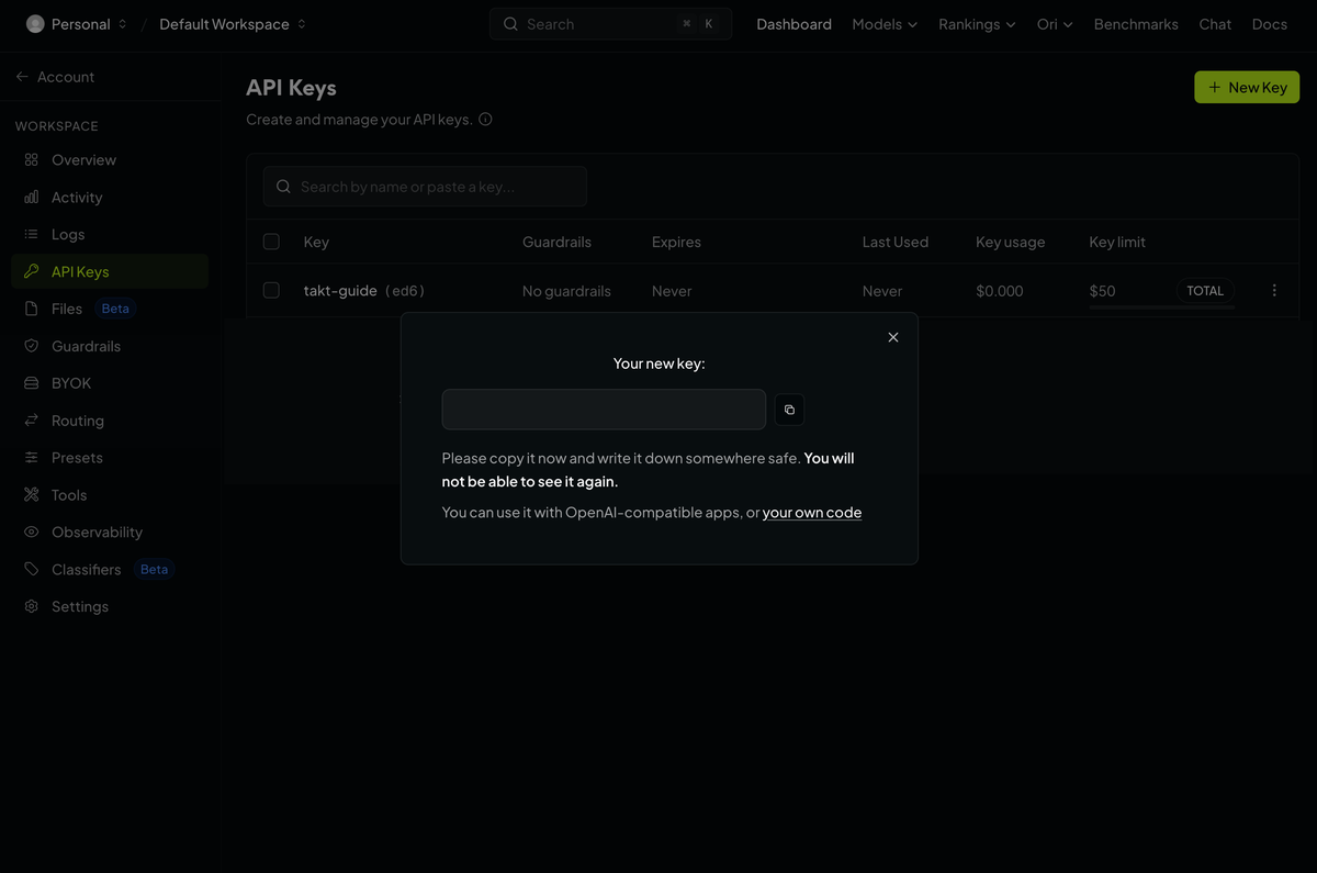 The Your new key window, with the key hidden, a copy button, and a notice that the key cannot be seen again.